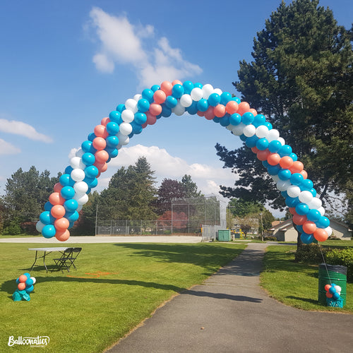 blue, coral, and white helium spiral 30ft arch by Vancouver Balloons