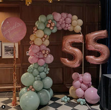 Load image into Gallery viewer, Soft pink and green organic door arch with custom calligraphy balloon on the side
