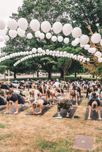 Load image into Gallery viewer, White pearl string arch created by VancouverBalloons for Lulu Lemon yoga event