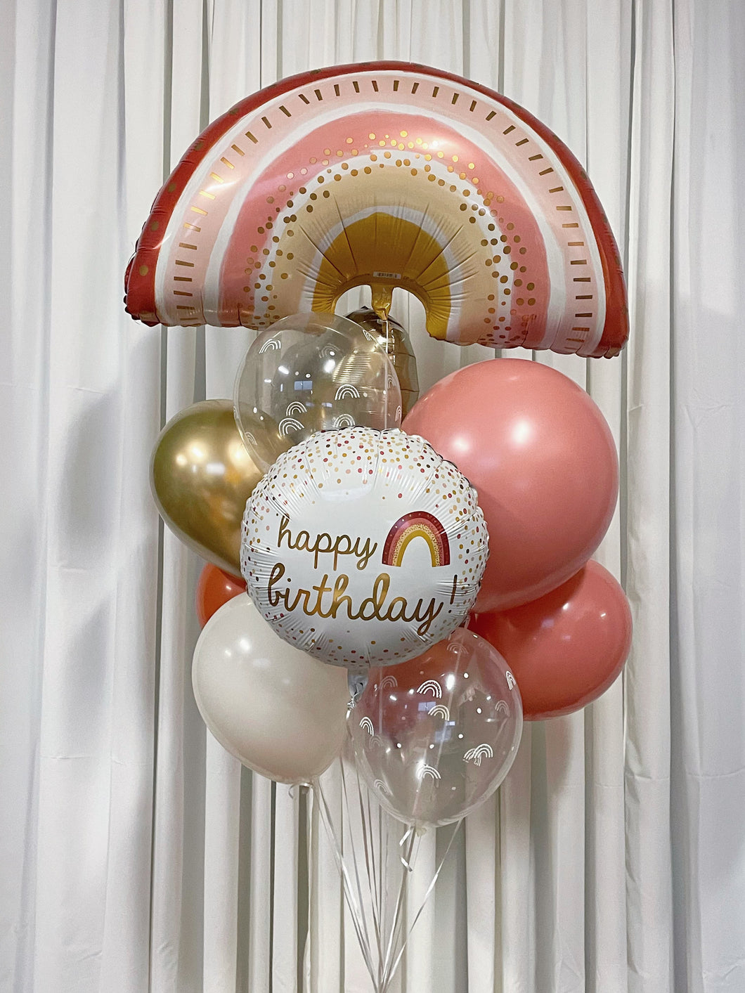 boho rainbow supershape with happy birthday foil mylar and retro color balloons