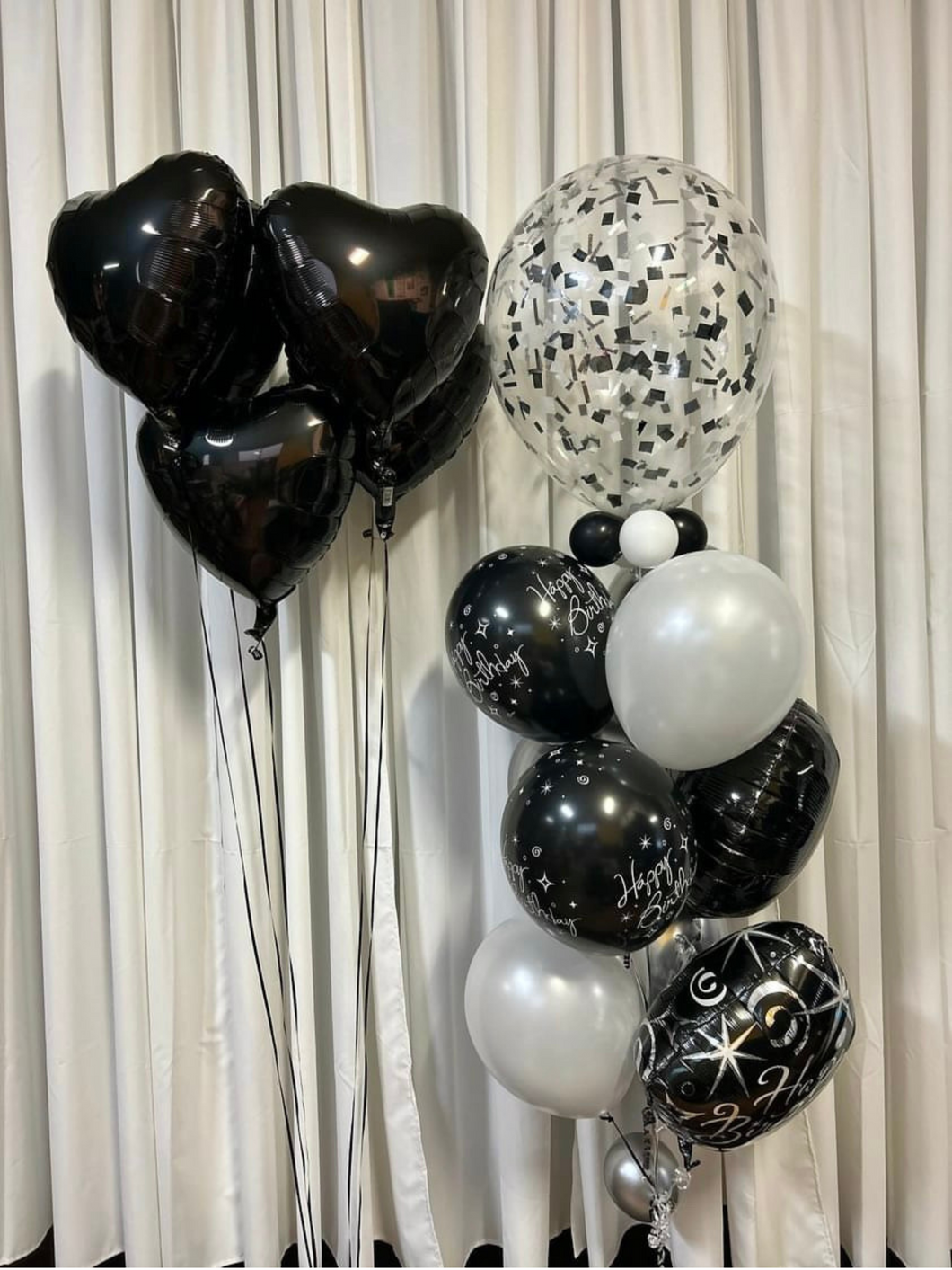 black heart balloons with bouquet of confetti balloons black and silver birthday balloons