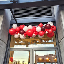 Load image into Gallery viewer, Red and white balloon garland outdoors
