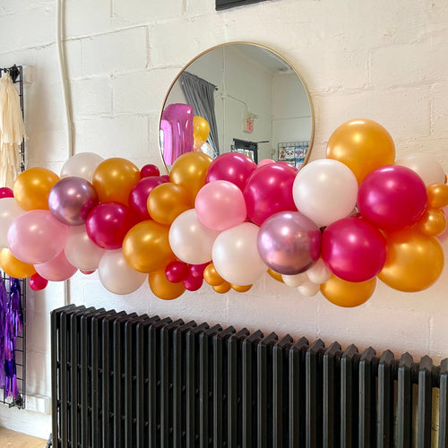 Pink fruit punch organic garland structure