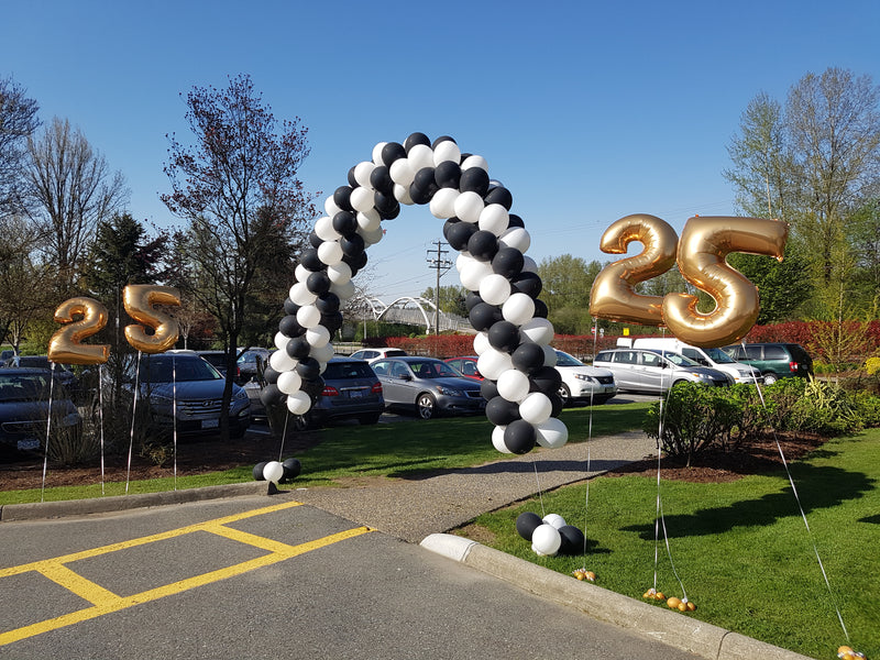 Black and white helium spiral arch created by VancouverBalloons14
