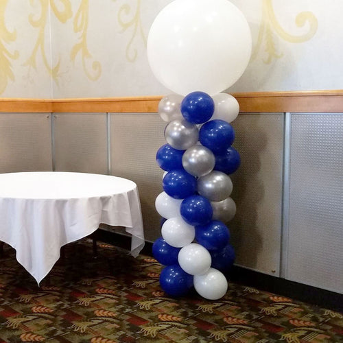 blue and white indoor balloon column