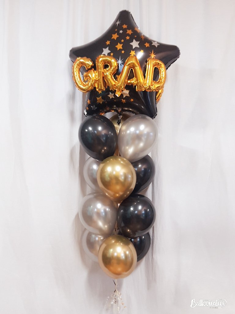 grad star supershape balloon with gold silver and black latex balloons