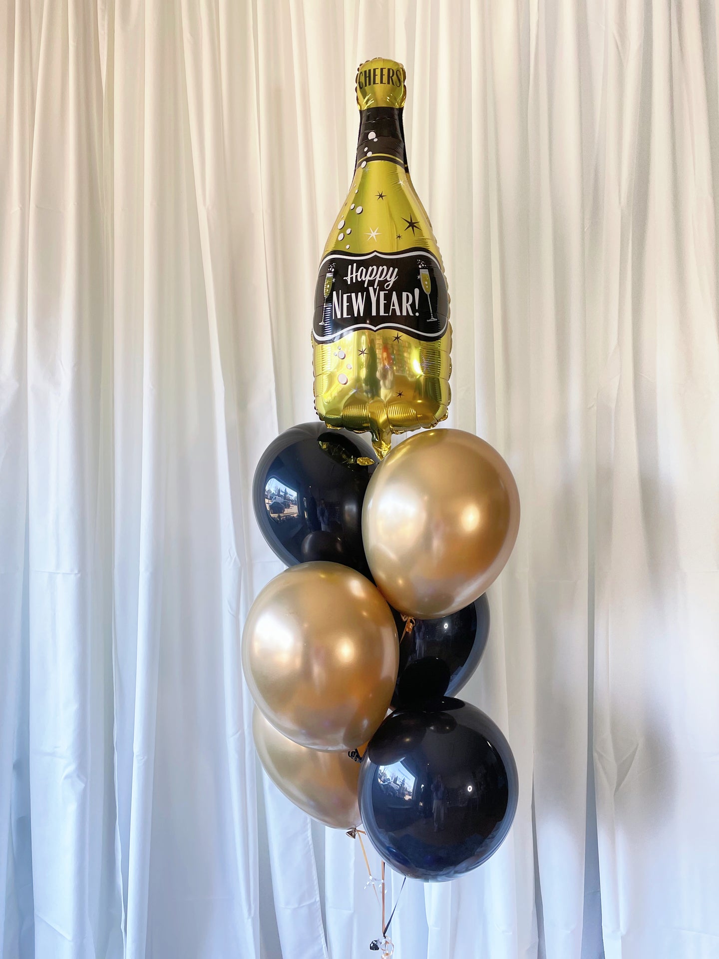 Double-sided Happy New Year Champagne bottle bouquet of 7