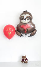 Load image into Gallery viewer, A sloth holding a red heart mylar foil balloon
