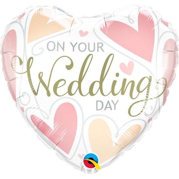A heart-shaped white foil balloon with a 
